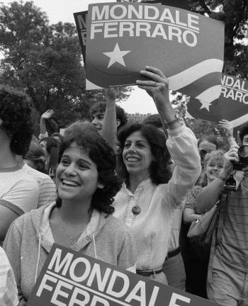 Women students holding "Mondale/Ferraro" signs show their support for Mondale 