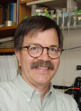 James E Huettner, PhD