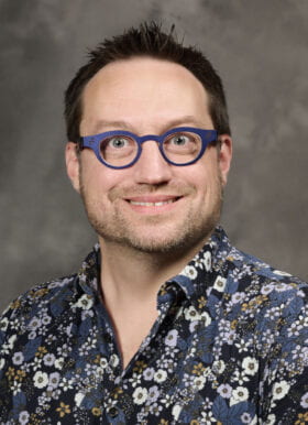 David J Kast, PhD